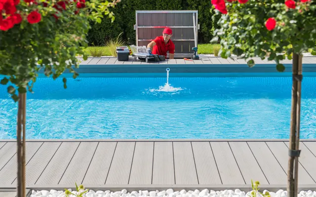 Swimming pool maintenance man